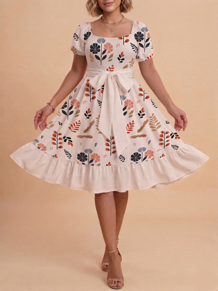 Damen Kleid mit tailliertem Schnitt und verspieltem Blumenmuster Echo Archiv