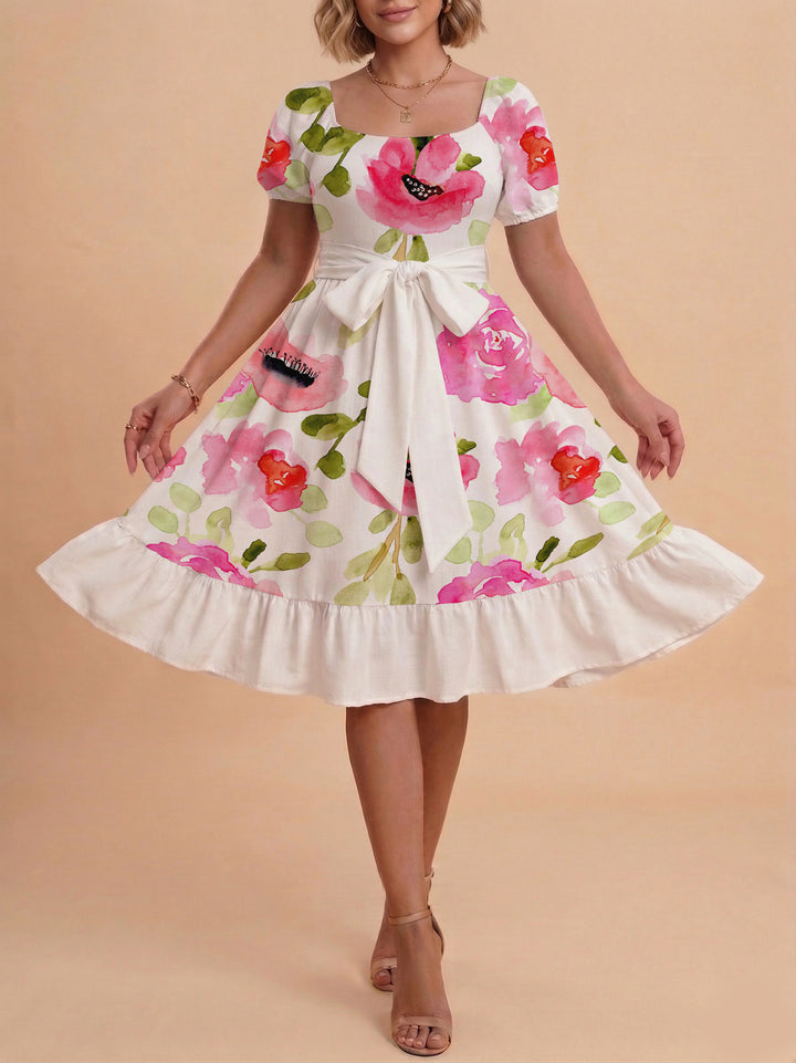 Damen Sommerliches Blumenkleid mit taillierbarem Gürtel und voluminösen Ärmeln Echo Archiv