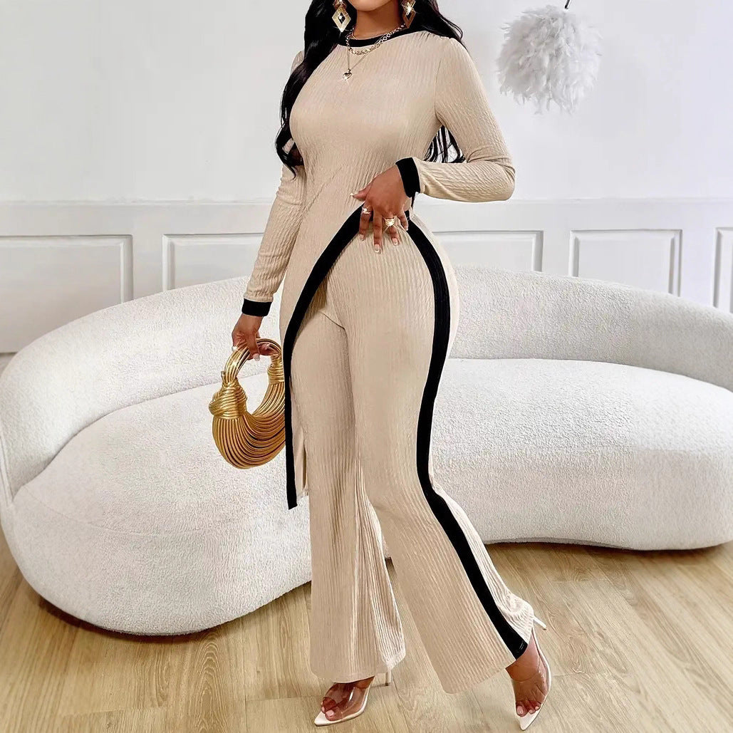 Damen nan eleganter Rippen-Jumpsuit mit asymmetrischer Wickeloptik, taillierendem Cut-Out und kontrastierenden Seitenstreifen Echo Archiv