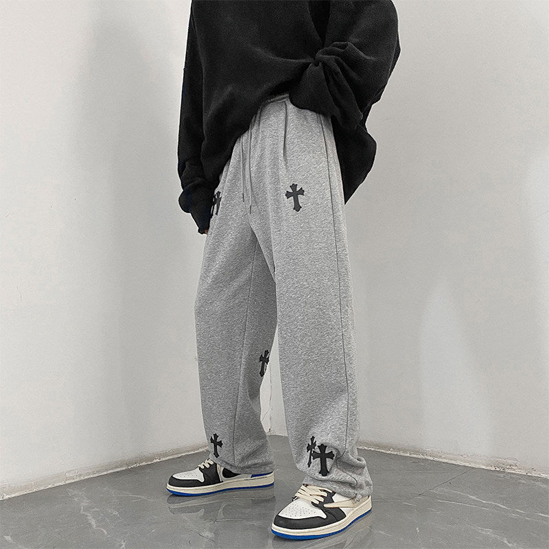 Herren weite Baumwoll-Jogginghose mit Allover-Kreuzprint und elastischem Tunnelzugbund Echo Archiv