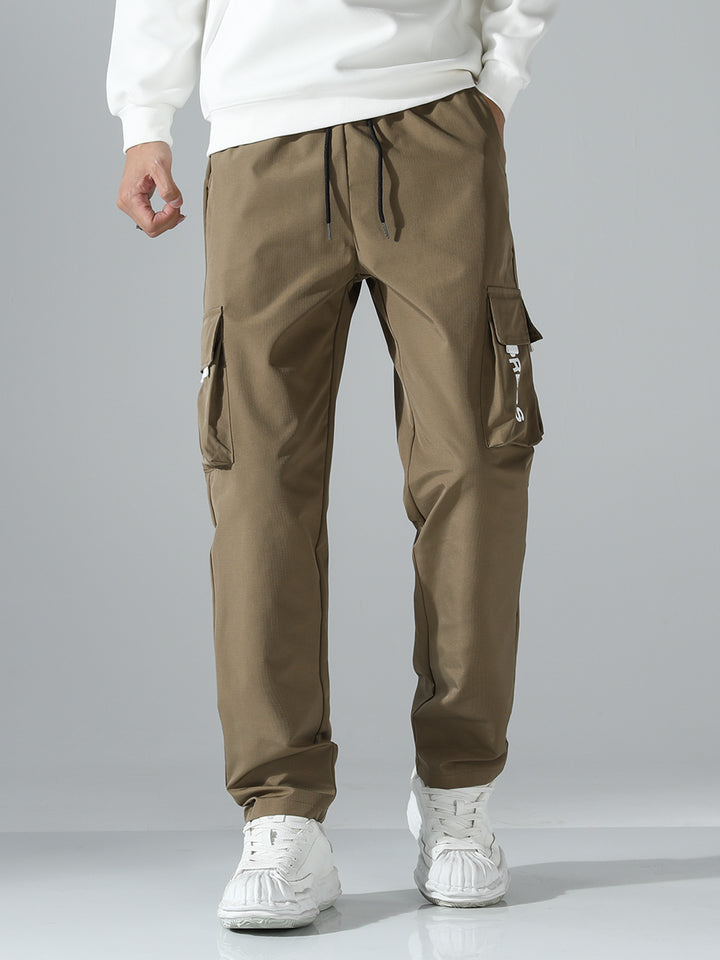 Herren Tapered Cargo-Jogginghose mit elastischem Tunnelzug, multifunktionalen Klapptaschen & ergonomischen Nähten Echo Archiv