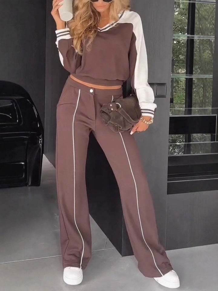 Damen nan sportlich-elegantes Zweiteiler-Set aus Baumwollmix mit V-Ausschnitt Sweatpullover und hochgeschnittener Schlaghose Echo Archiv