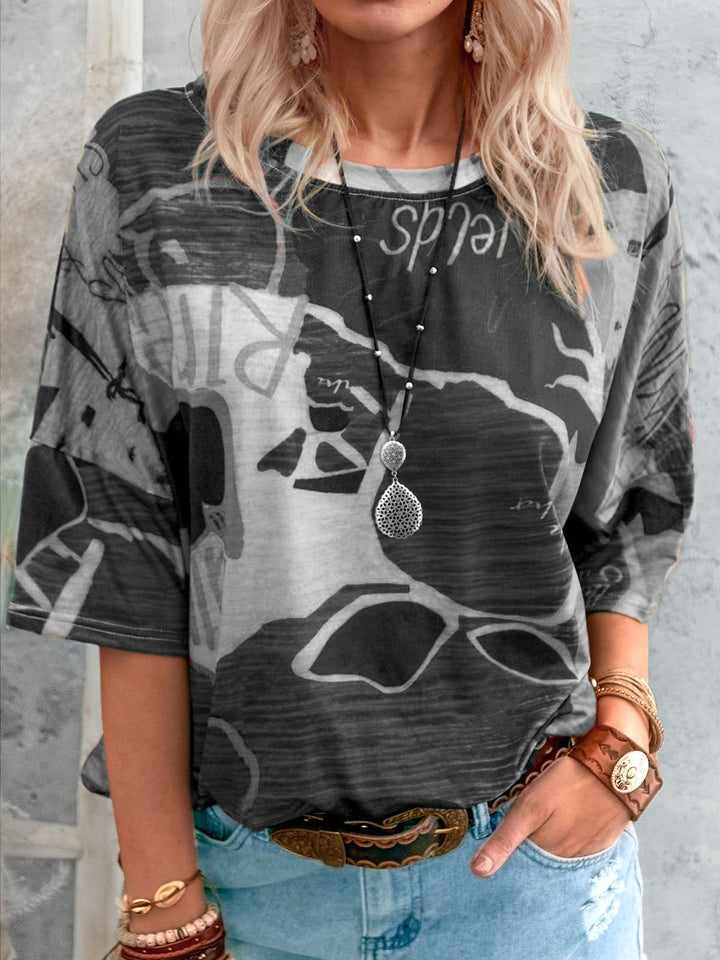 Damen Lockere Viskose Druckbluse mit halblangen Ärmeln und Rundhalsausschnitt – Élovi