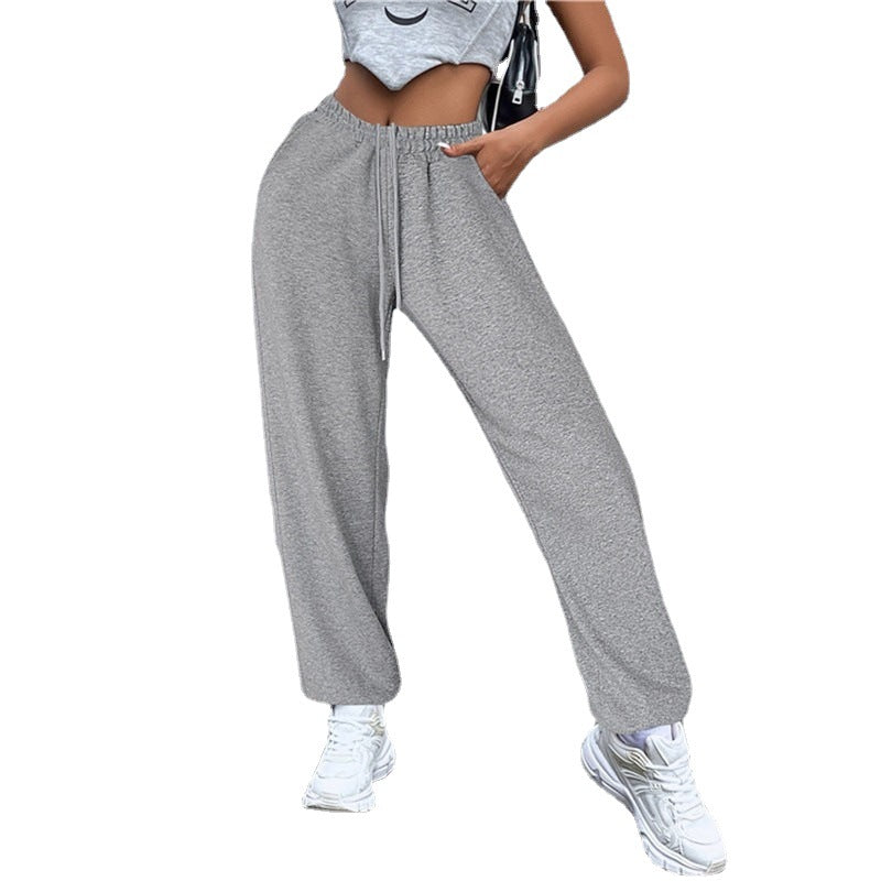Damen weite Jogginghose hochgeschnitten mit seitlichem Statementprint und elastischem Bund – Avélisse