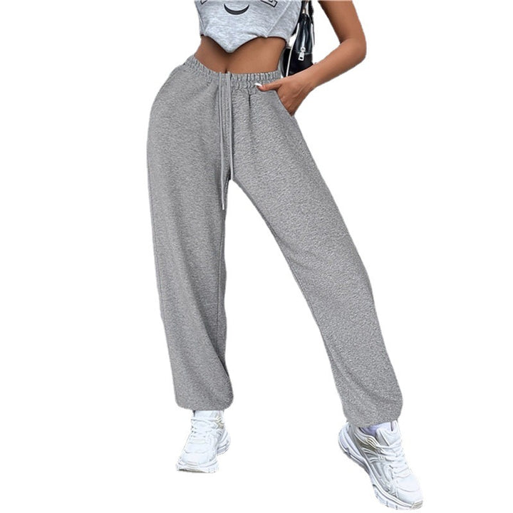 Damen weite Jogginghose hochgeschnitten mit seitlichem Statementprint und elastischem Bund – Avélisse