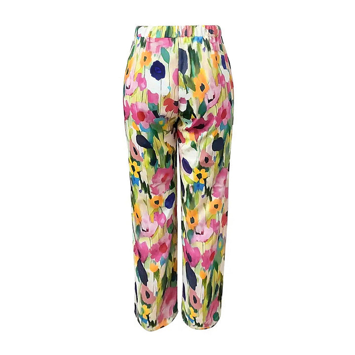 Damen Weite Sommerhose mit floralem Design und praktischen Taschen Echoarchiv