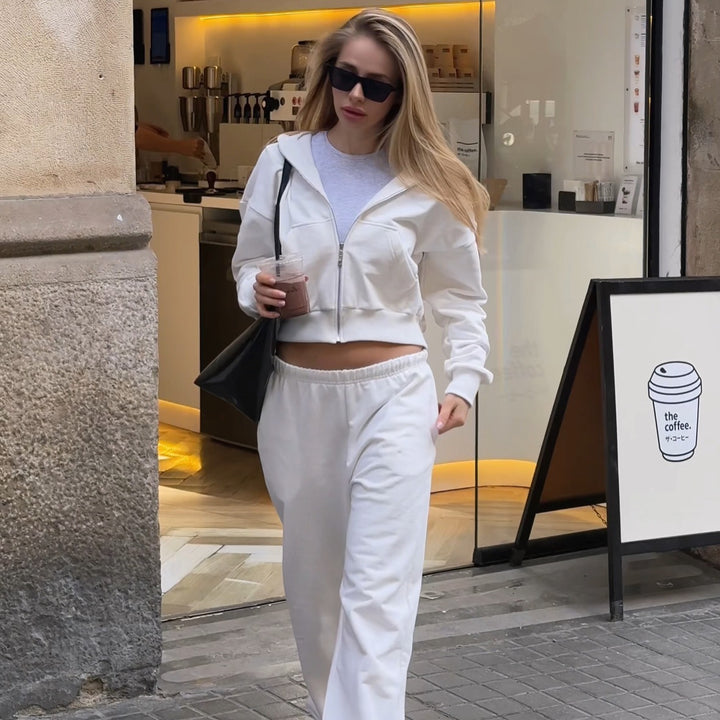 Damen Cropped Kapuzen-Sweatjacke mit Kängurutasche und tailliertem Rippbund – Auréline