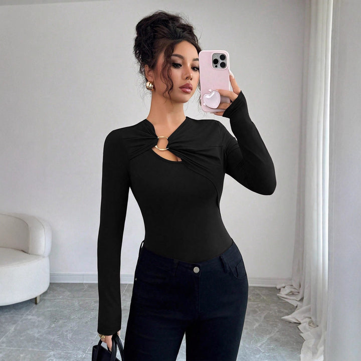 Damen nan figurbetonter Langarm-Body mit Leopardenprint und Zier-Ring Echo Archiv
