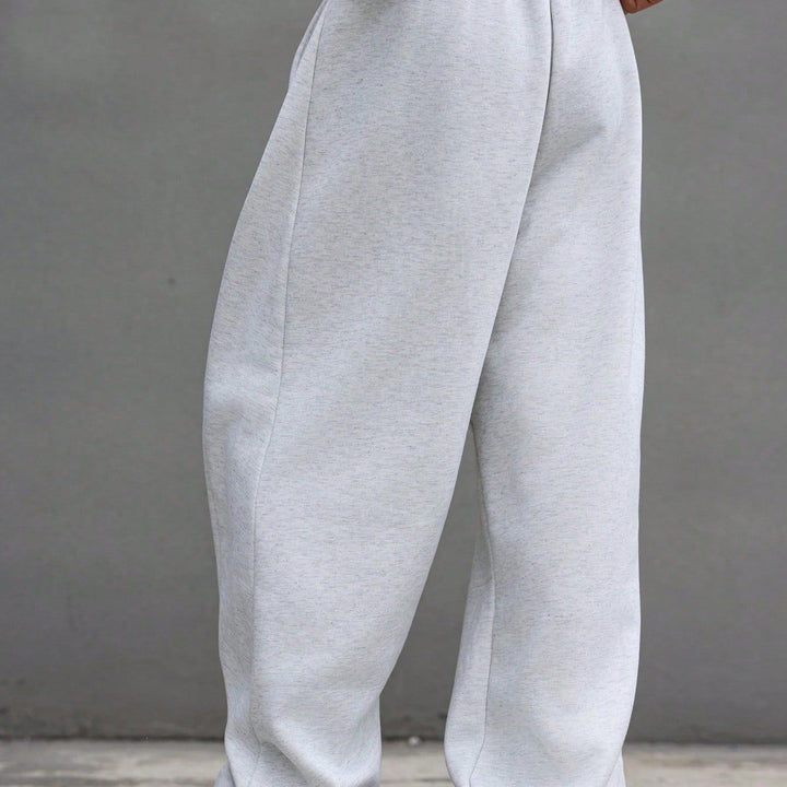 Herren Weite Baggy-Jogginghose mit elastischem Bund, Tunnelzug & extra langem Bein Echoarchiv