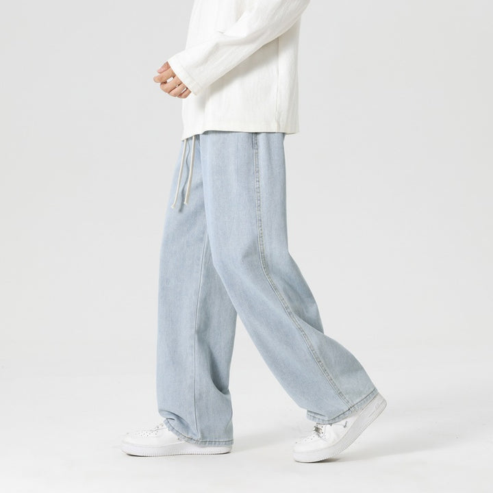 Herren lässige weite Jeanshose mit elastischem Bund und seitlichen Eingrifftaschen Echoarchiv