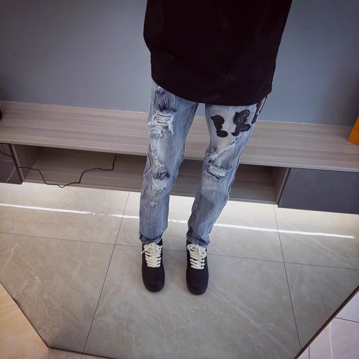 Herren Modische Ripped Denim Jeans mit kreativem Schnitt Echoarchiv