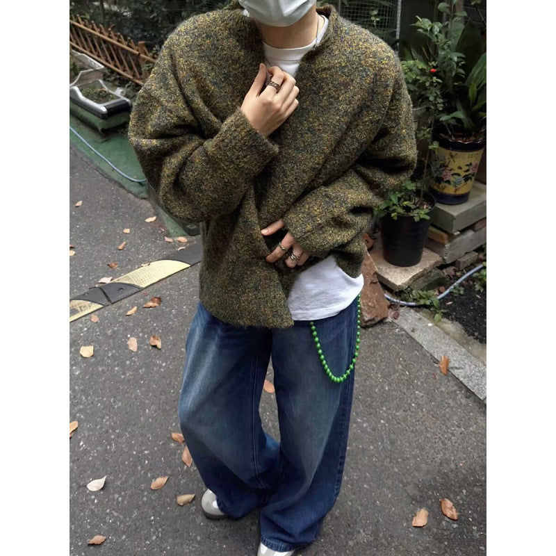 Herren Melangé Grobstrick-Pullover mit V-Schlitz und lockerem Oversize-Schnitt Echoarchiv