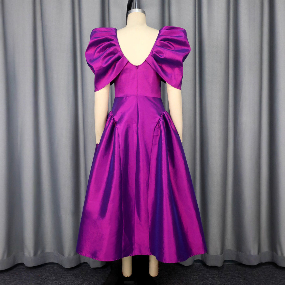 Damen elegantes Midikleid mit voluminösen Puffärmeln und schwingendem Rock Echo Archiv