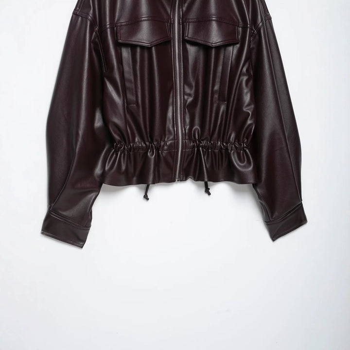 Damen Oversize Kunstleder-Bomberjacke mit Funnelkragen, Tunnelzug-Taille und Pattentaschen Echoarchiv