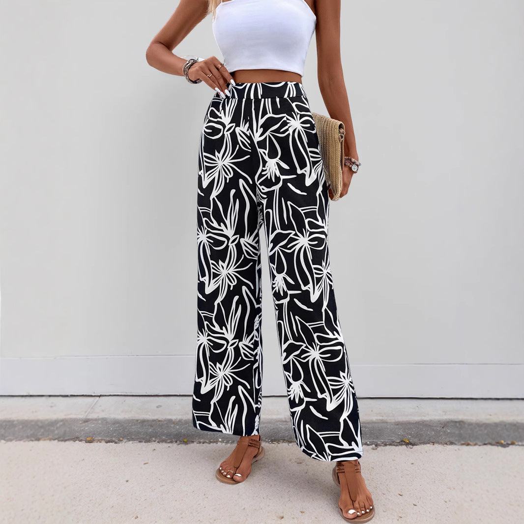 Damen Hochtaillierte Weite Hose mit floralem Muster Echo Archiv