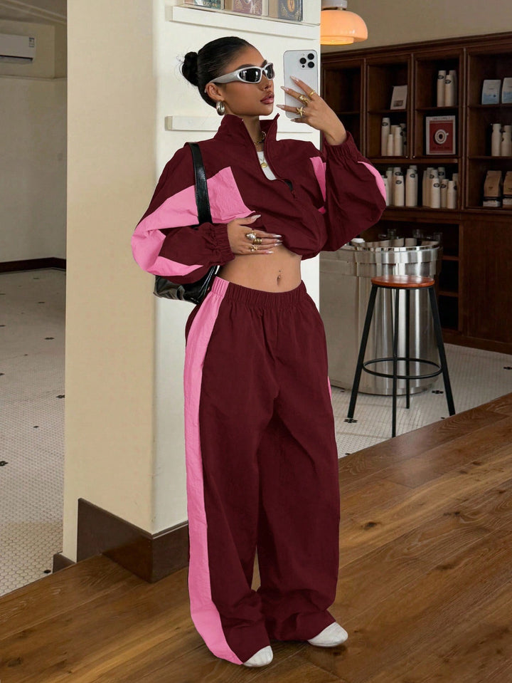 Damen Cropped-Trainingsjacke und hochgeschnittene Breitbein-Jogginghose im Set Echo Archiv