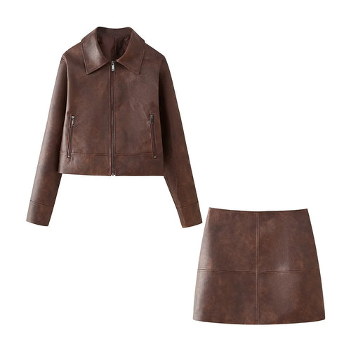 Damen kurz geschnittene Lederimitat-Jacke mit Reißverschluss, spitzem Kragen und Reißverschlusstaschen – Célinea