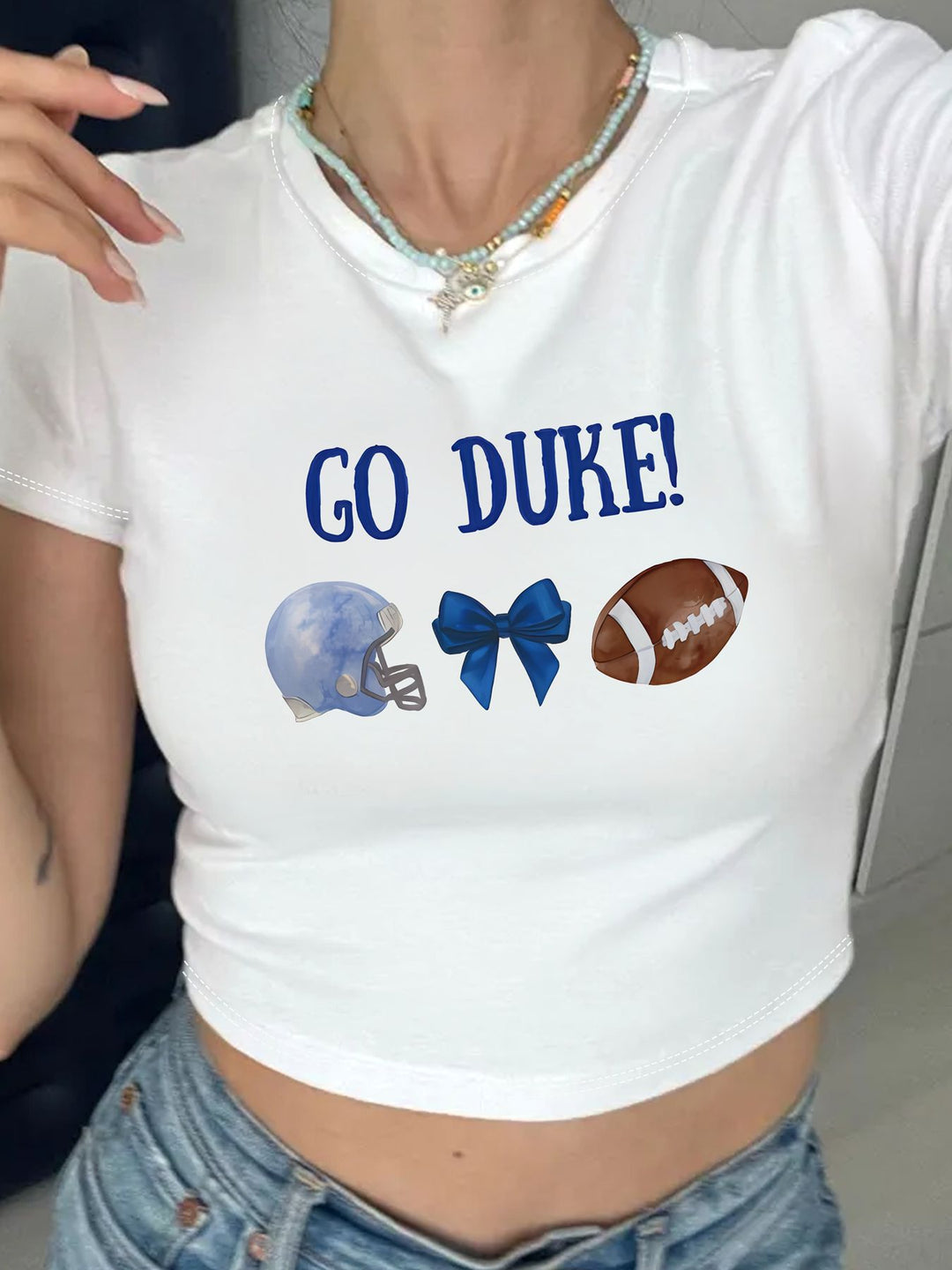 Damen Crop-T-Shirt mit kreativem Augenmotiv und Tourdruck Echo Archiv