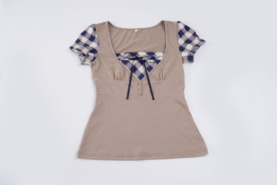 Damen modisches Oberteil mit asymmetrischem Karomuster und eleganten Rüschendetails Echo Archiv