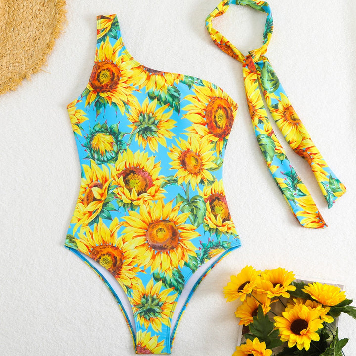 Damen Einteiliger Badeanzug mit asymmetrischem Schnitt und Sonnenblumenmuster Echo Archiv