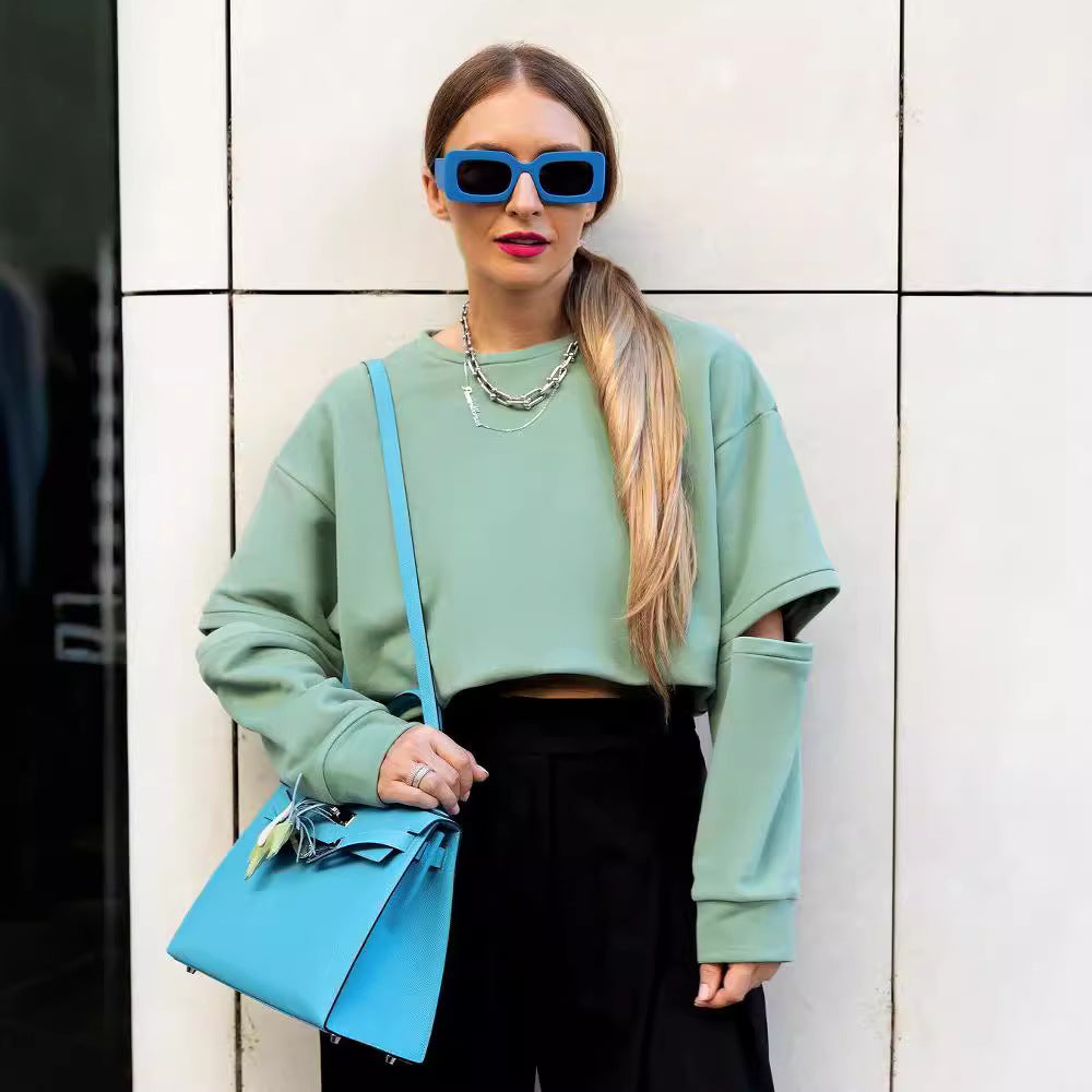 Damen Oversized Sweatshirt mit Layer-Ärmeln und seitlichem Schlitz Echoarchiv