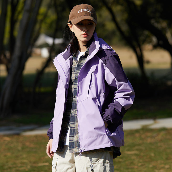 Damen zweilagige wasserabweisende Outdoorjacke mit Kapuze, Taillenregulierung und Kontrastbesätzen Echoarchiv