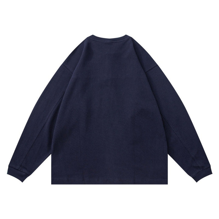 Unisex Strukturiertes Henley-Longsleeve mit Waffelstruktur, halber Knopfleiste und überschnittener Schulter Echoarchiv