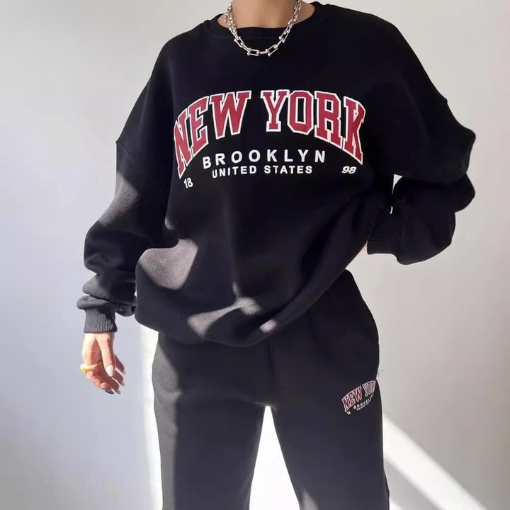 Damen Oversized Lounge-Set aus Baumwollfleece mit Collegestickerei und relaxed Jogginghose Echoarchiv
