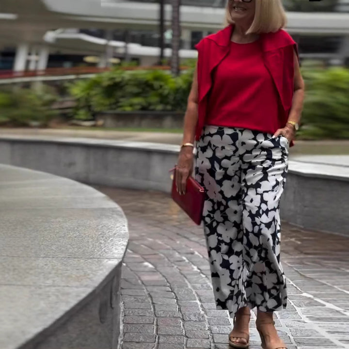 Damen nan weite Palazzohose mit großblumigem Print, hohem Bund und Eingrifftaschen Echo Archiv