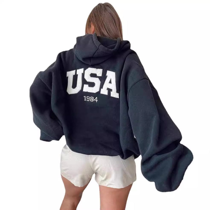 Damen Kurz geschnittener Oversize-Kapuzenpullover mit aufgenähter College-Applikation und gerippten Bündchen Echoarchiv