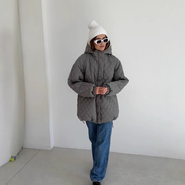 Damen Oversize Steppjacke mit Teddyfutter und Kapuze Echoarchiv