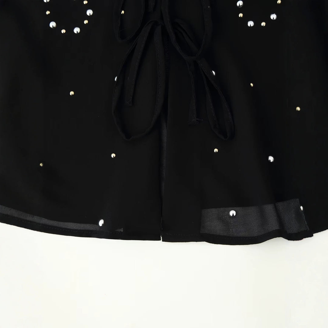 Damen Chiffon-Bluse mit Paillettenbesatz, tiefem V‑Ausschnitt und dekorativen Bindebändern Echoarchiv