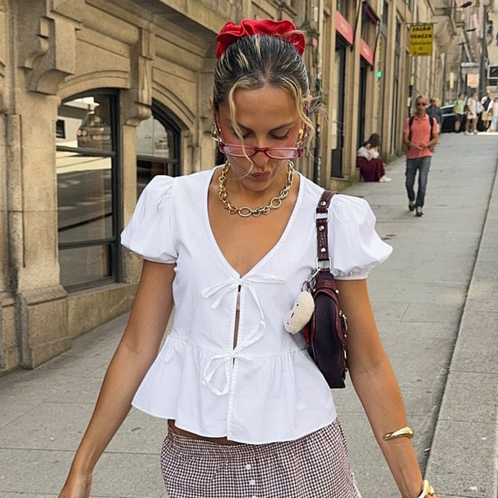 Damen Wickeloberteil mit Puffärmeln und femininem Peplum-Saum Echo Archiv