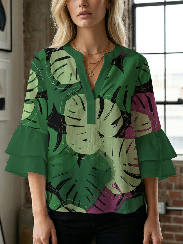 Damen Bluse mit voluminösen Flügelärmel und intensivem Blattmuster Echo Archiv