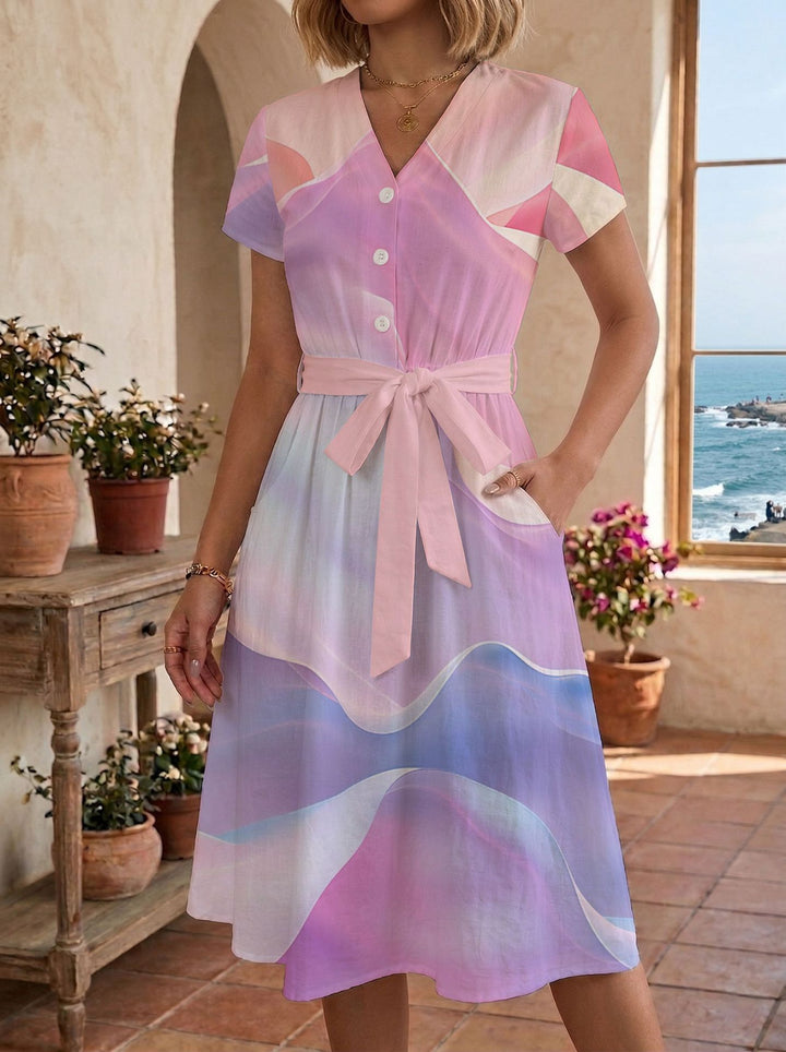 Damen Sommerliches Kleid mit taillierbarem Bindegürtel und floralem Muster Echo Archiv