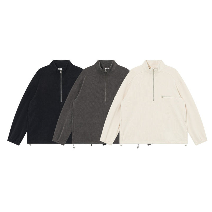 Unisex Oversize Halbzip-Pullover aus Cord‑Mix mit Brust-Reißverschlusstasche und Kordelzugsaum Echoarchiv