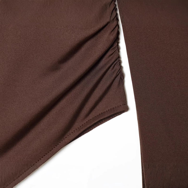 Damen Body mit tiefem V‑Ausschnitt, Raffung und Metallschließe Echoarchiv
