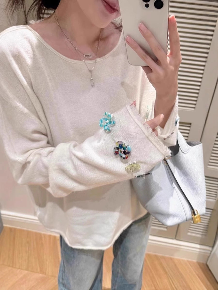 Damen Oversize-Feinstrickpullover mit schmuckbesetzten Ärmelabschlüssen Echoarchiv