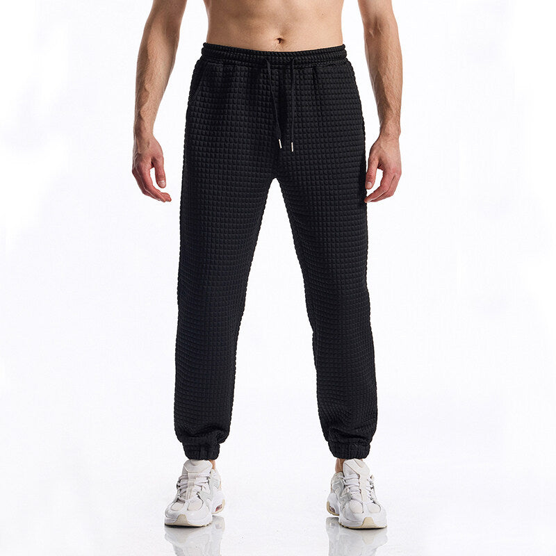 Herren Strukturierte Waffel-Jogginghose mit elastischem Bund und schmal zulaufendem Bein Echo Archiv