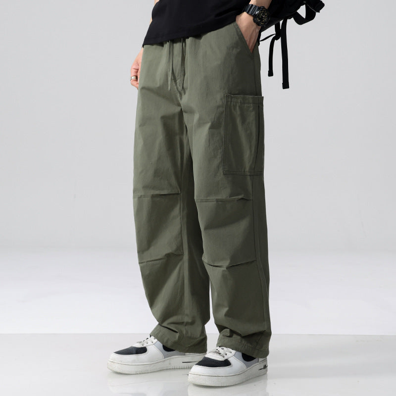 Herren Weite Cargohose im Utility‑Stil mit Kordelzug und aufgesetzten Beintaschen Echoarchiv