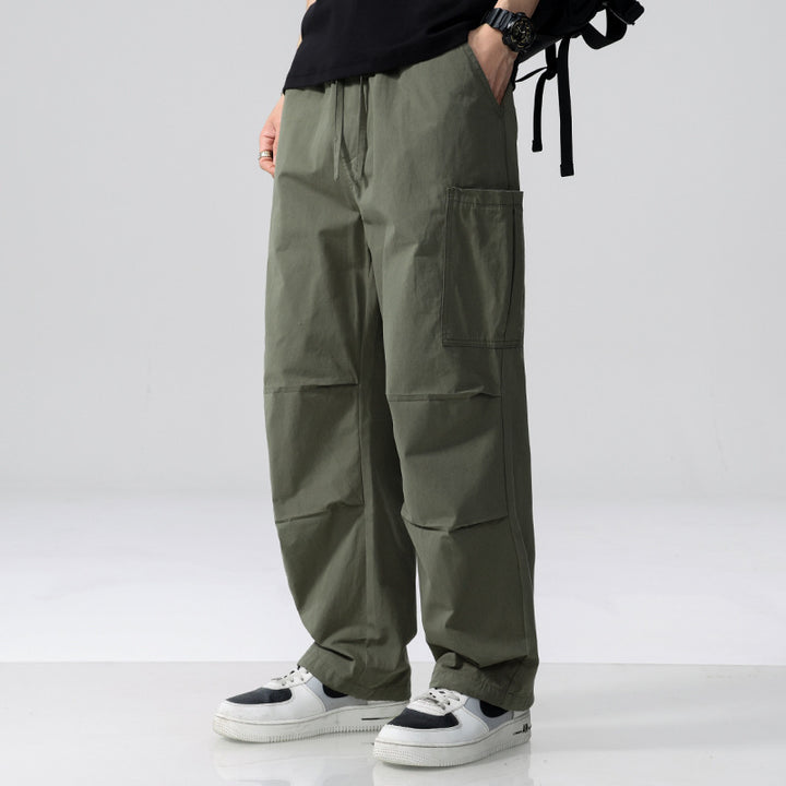 Herren Weite Cargohose im Utility‑Stil mit Kordelzug und aufgesetzten Beintaschen Echoarchiv