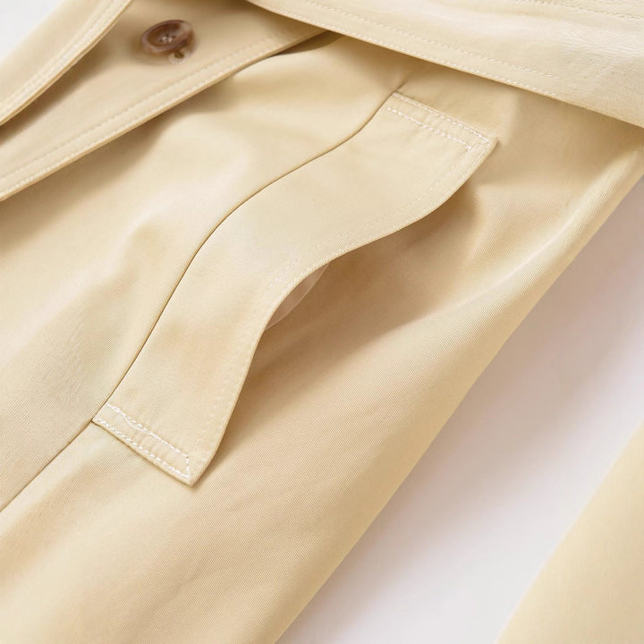 Damen Midi-Trenchcoat aus leichtem Funktionsstoff mit Bindegürtel und Sturmklappe Echoarchiv