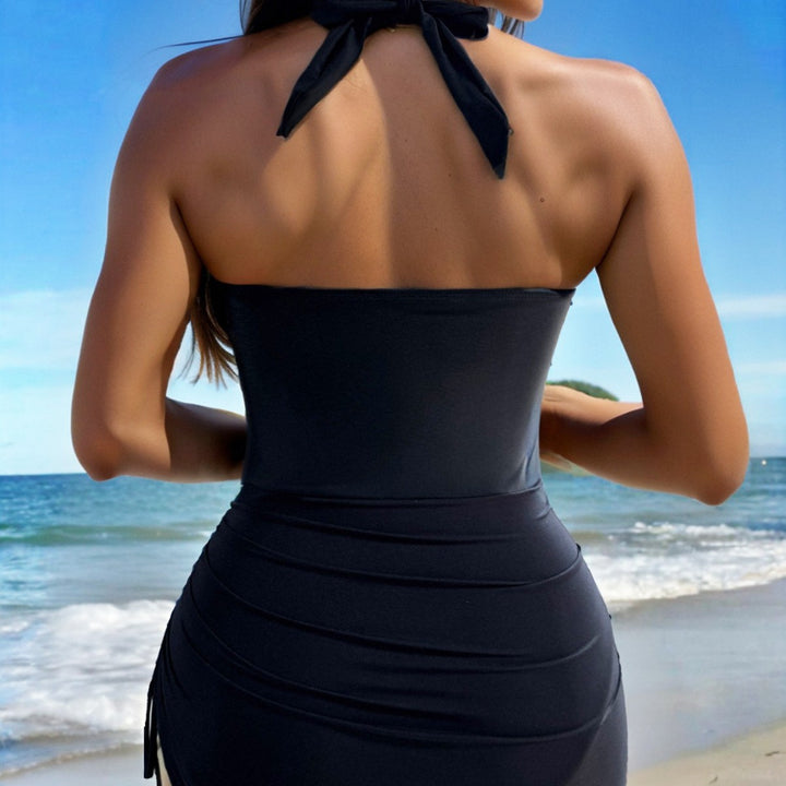 Damen Eleganter Badeanzug mit Wickeldesign und goldenen Akzenten Echo Archiv