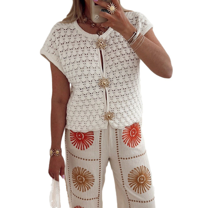 Damen Strickoberteil mit floralen Knöpfen und luftiger Verarbeitung Echo Archiv