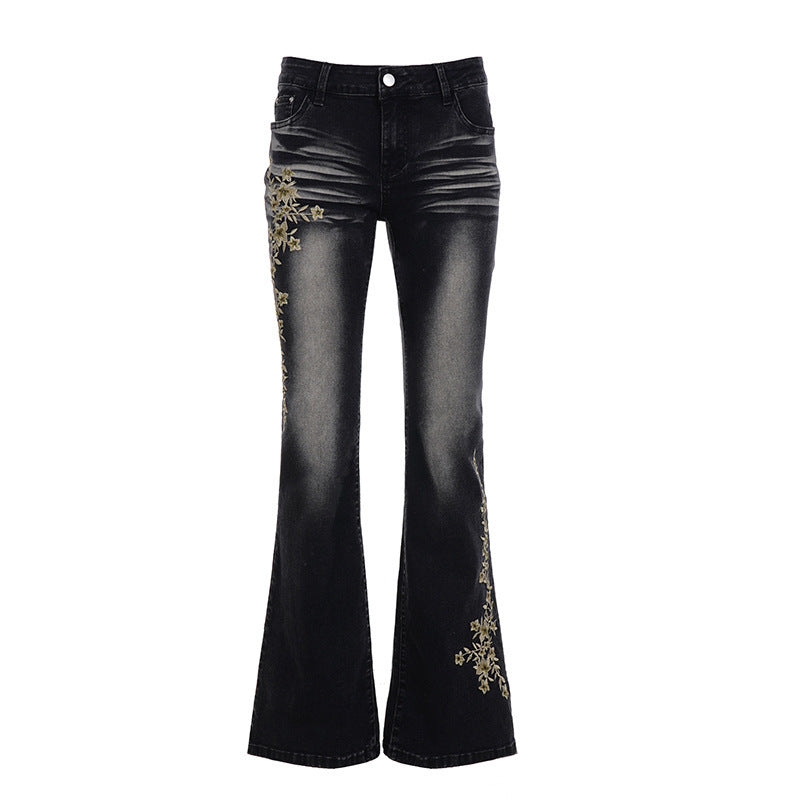 Damen hochtaillierte Schlagjeans mit floraler Stickerei und verwaschenem Look Echo Archiv