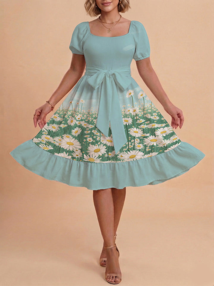 Damen Sommerliches Blumenkleid mit taillierbarem Gürtel und voluminösen Ärmeln Echo Archiv