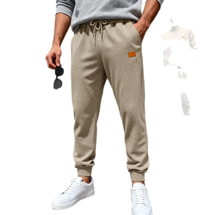 Herren Stepp-Jogginghose mit geometrischem Strukturmuster Echoarchiv