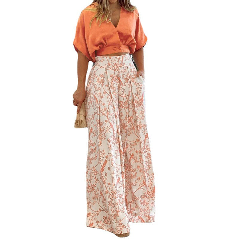 Damen Crop-Top Kombi-Anzug mit Weitem Rock und Floralem Muster Echoarchiv