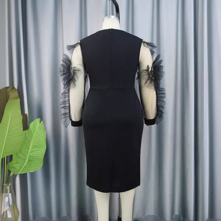Damen Elegantes Figurbetontes Kleid mit voluminösen Tüllärmeln Echo Archiv