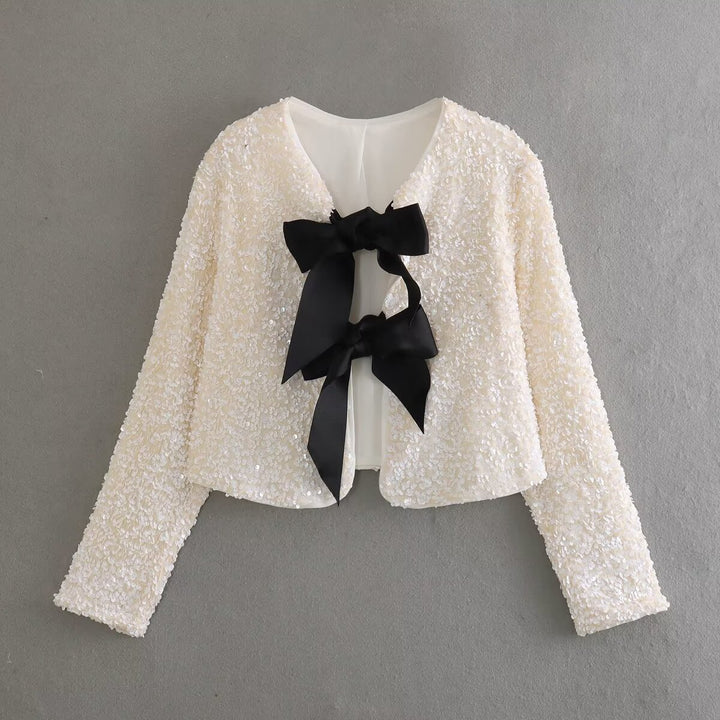 Damen glitzernde Cropped-Bolerojacke mit Paillettenbesatz und dekorativen Satinschleifen – Célinea